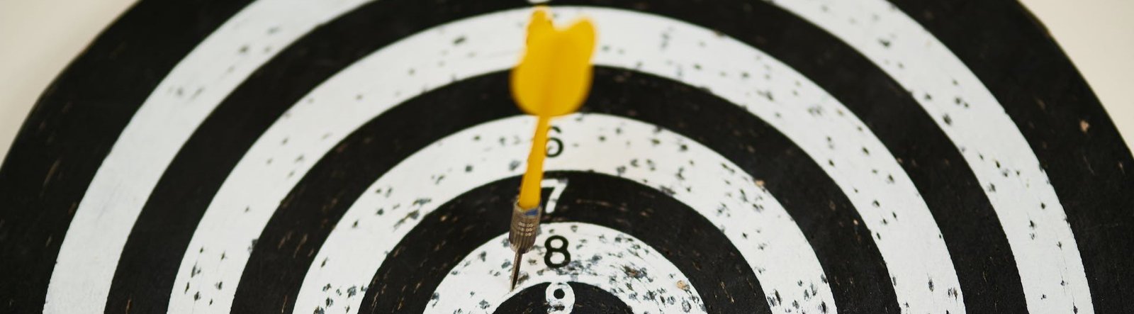 page hero, a dart hitting a target