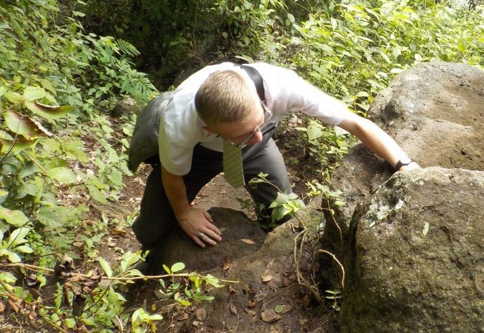 Landon climbing a rocky mountain