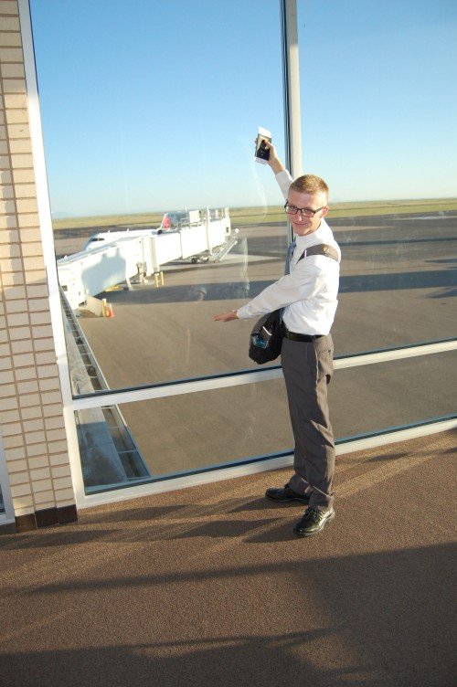 Landon Pointing to Airplane