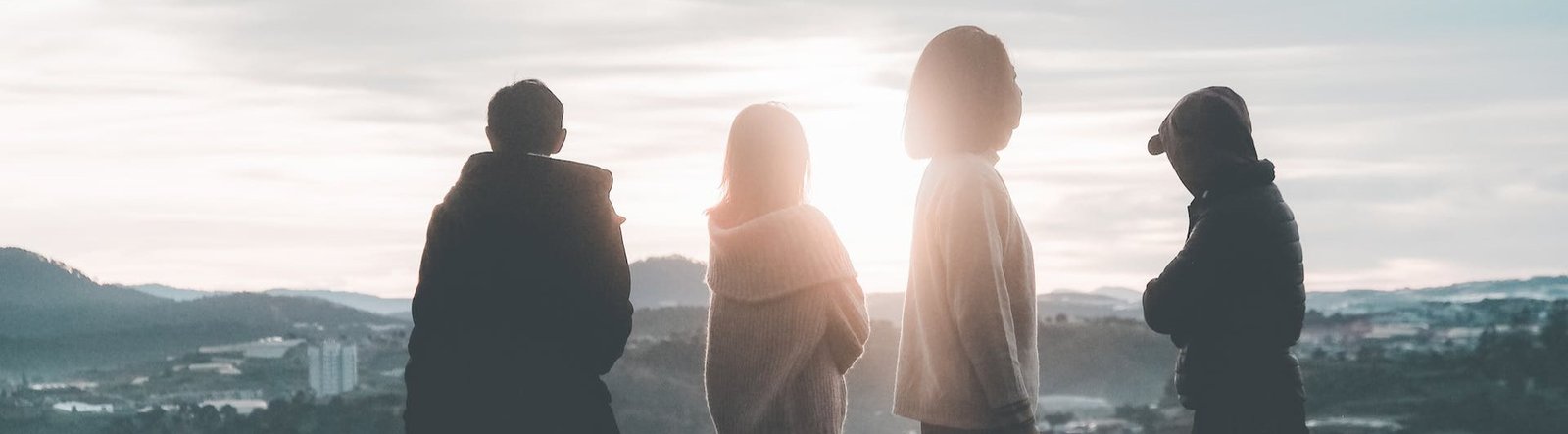 A group of people standing away from each other